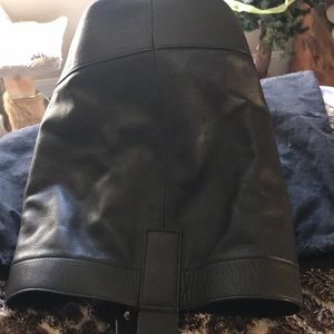 A Rag & Bone beautiful black leather sling backpack  (one strap adjustable)